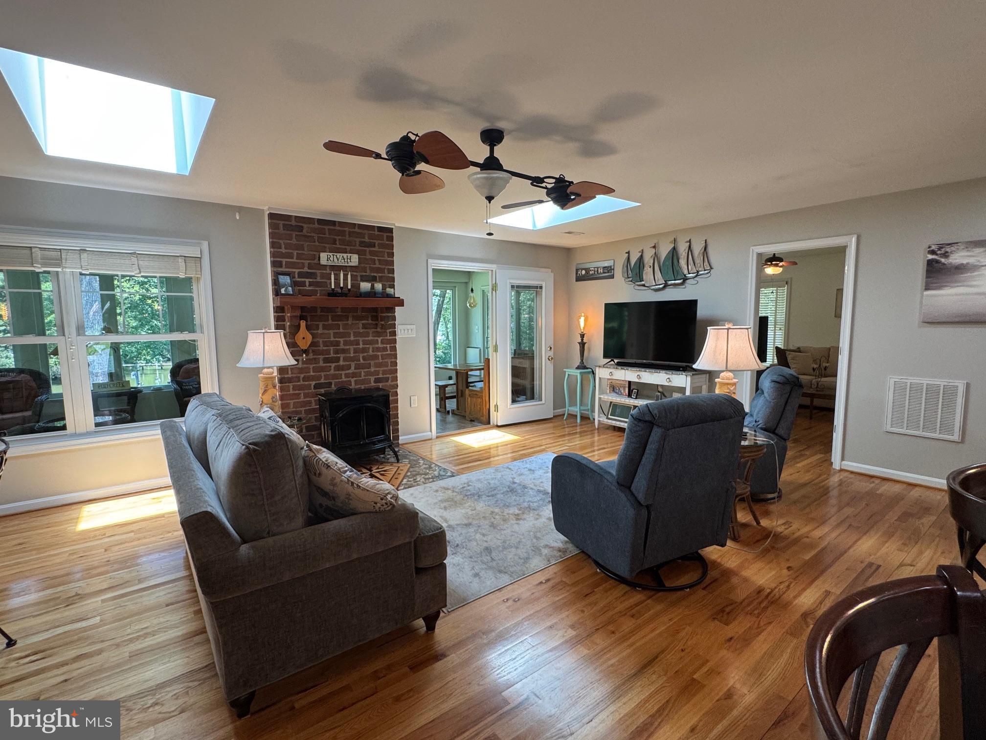 205 Trumps Court Reedville, VA 22539 - Photo 7 of 10 Open concept family room with gas FP