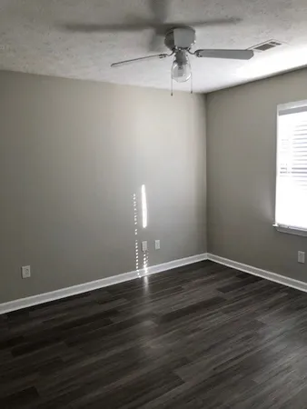 a backyard of a house with lots of green space