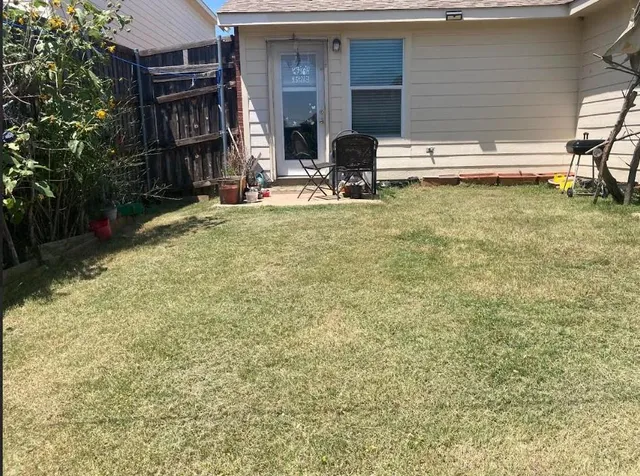 a view of a lounge chairs in the patio