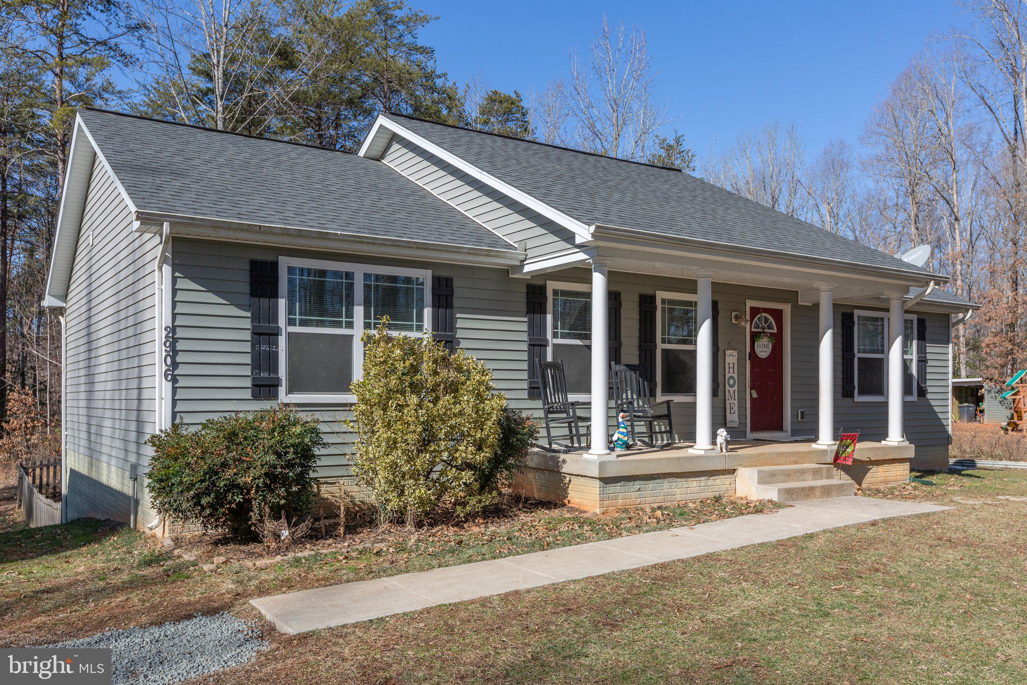 2906 Minor Road Bumpass, VA 23024 - Photo 3 of 48 Sage green vinyl siding w/ black shutters