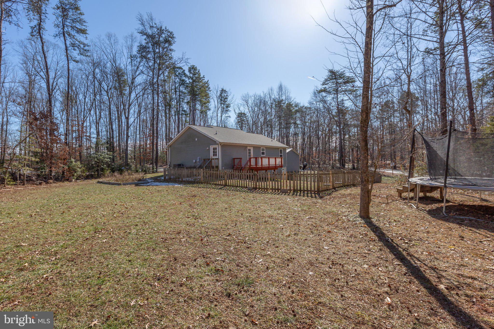 2906 Minor Road Bumpass, VA 23024 - Photo 42 of 48 View of the fenced in back yard