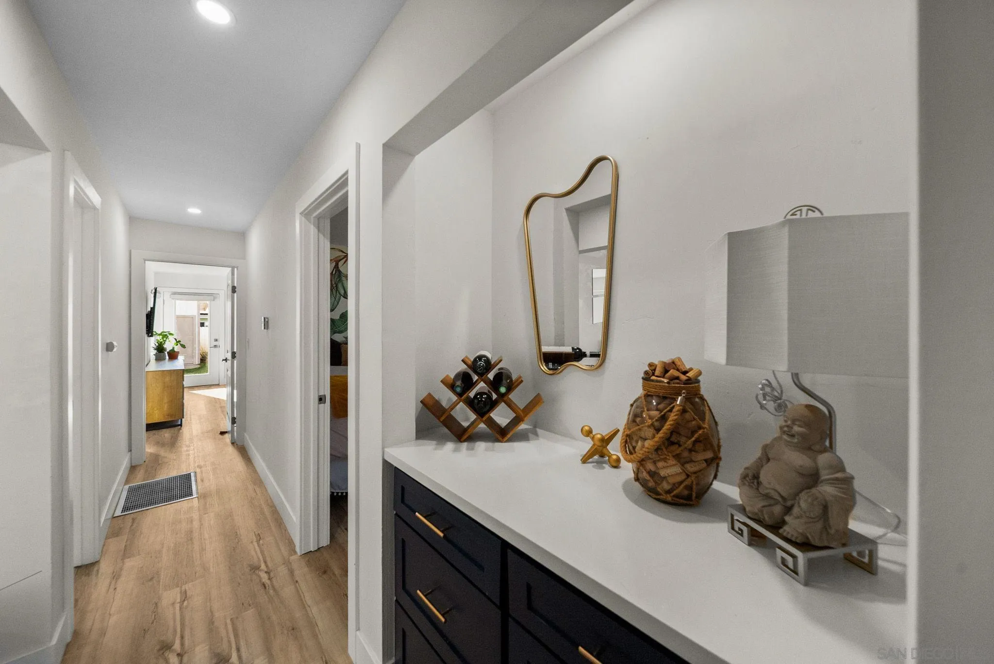 2618 Sheri Lane Lemon Grove, CA 91945 - Photo 13 of 39 a view of a bathroom with sink and mirror