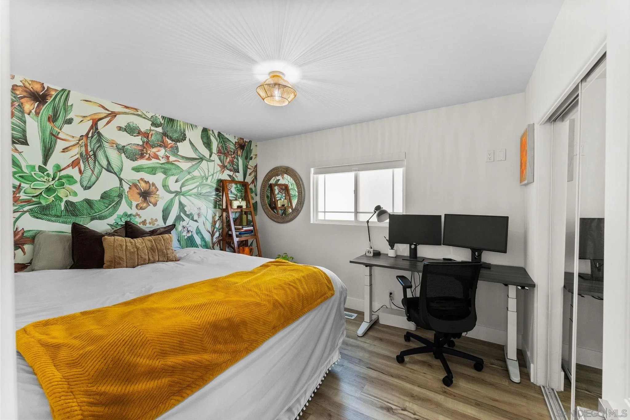 2618 Sheri Lane Lemon Grove, CA 91945 - Photo 14 of 39 a bed sitting in a bedroom next to a window