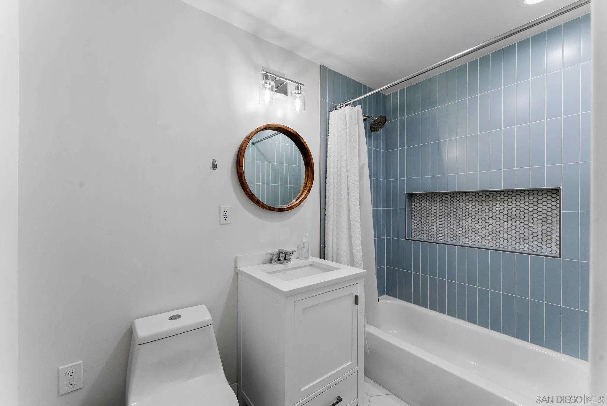 2618 Sheri Lane Lemon Grove, CA 91945 - Photo 15 of 39 a bathroom with a sink toilet and shower