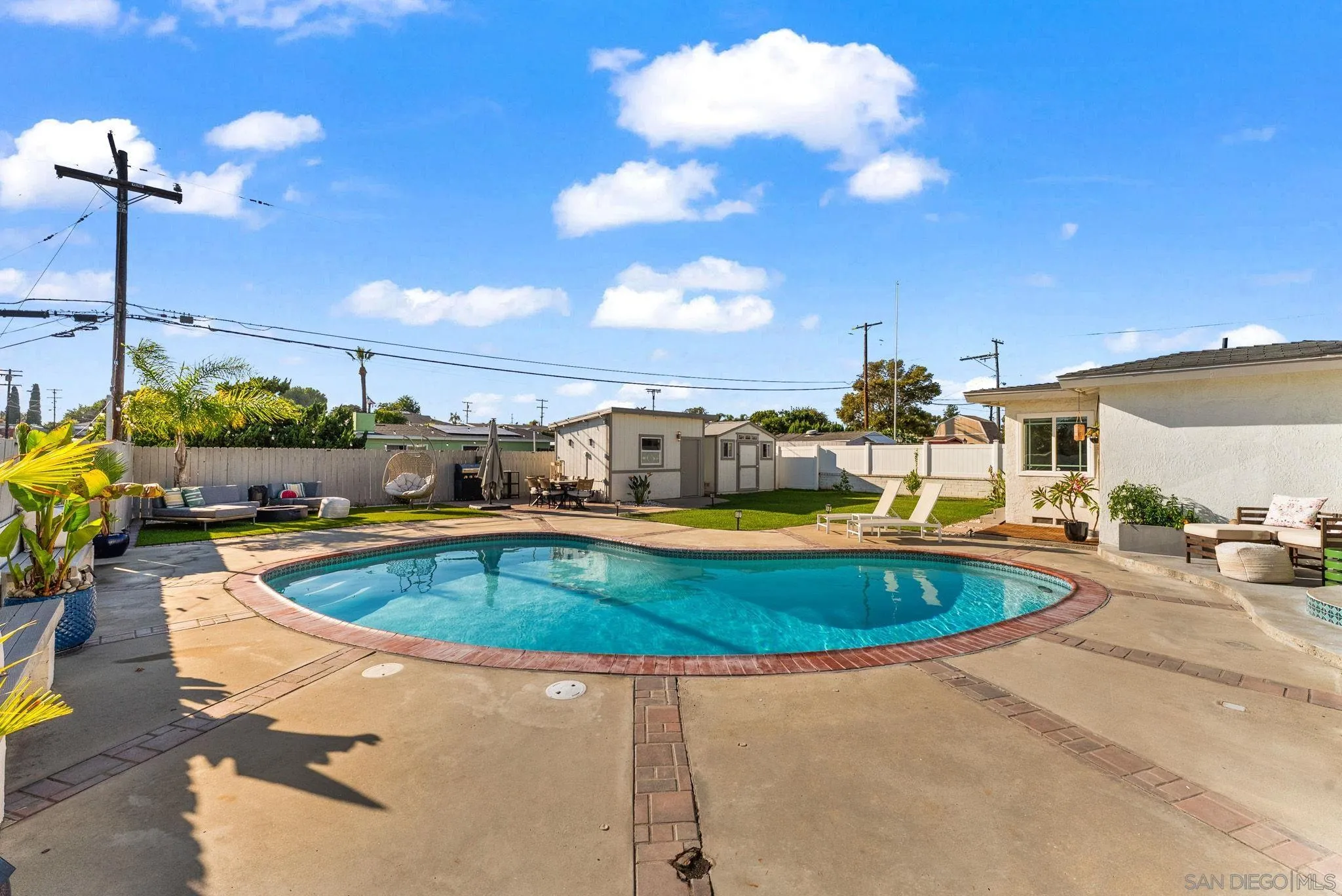 2618 Sheri Lane Lemon Grove, CA 91945 - Photo 20 of 39 a view of a swimming pool with a patio