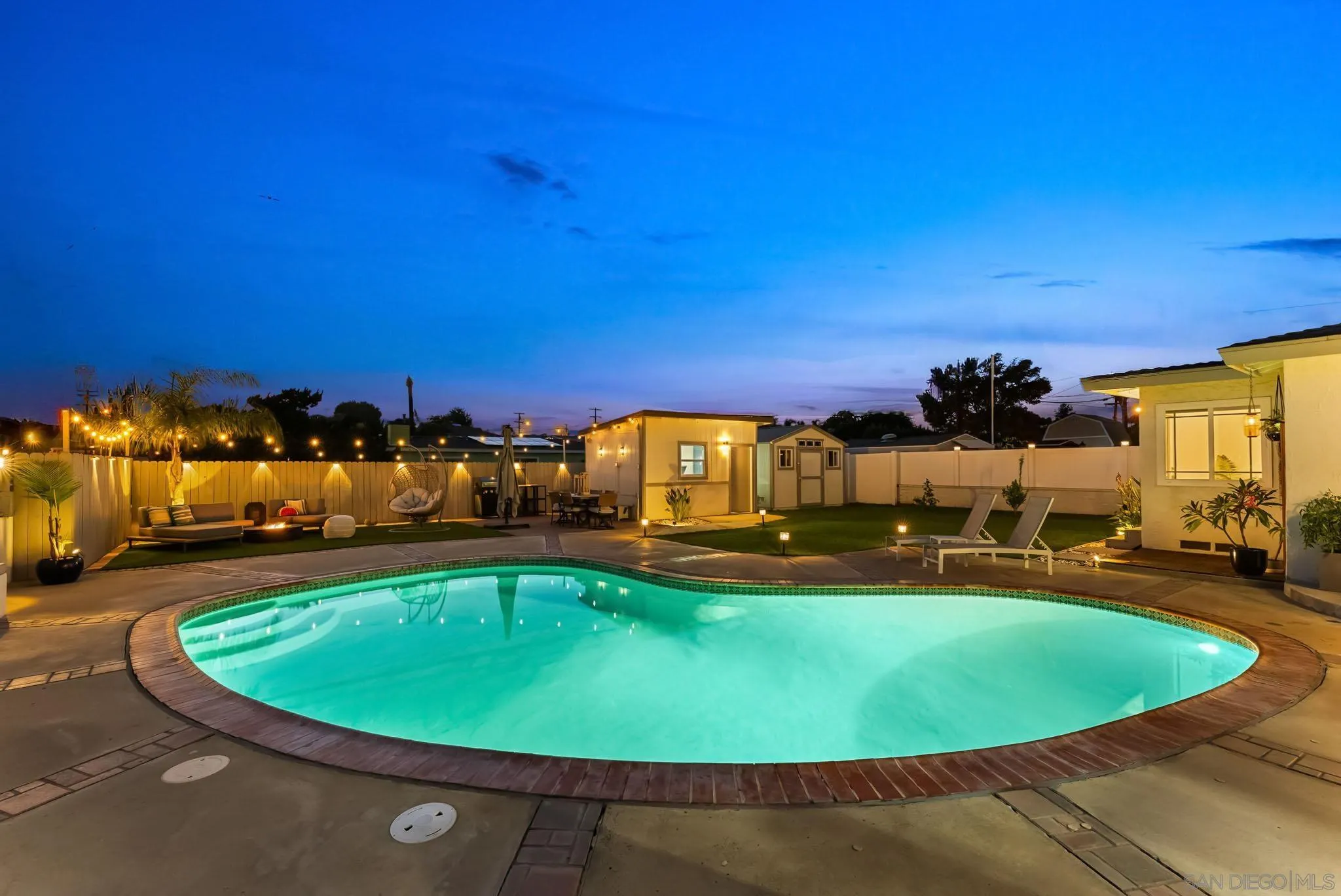 2618 Sheri Lane Lemon Grove, CA 91945 - Photo 21 of 39 a view of a swimming pool with lawn chairs