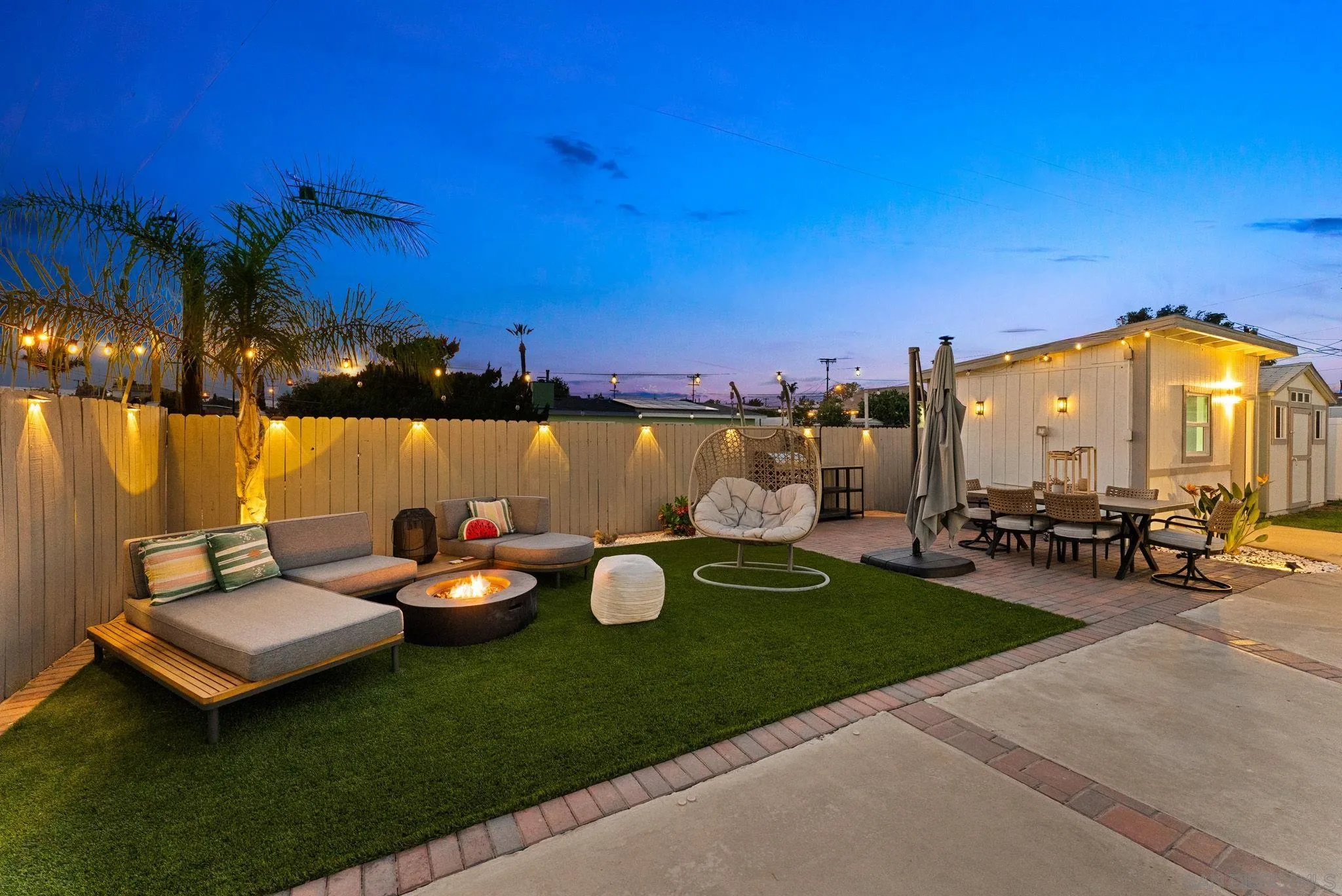 2618 Sheri Lane Lemon Grove, CA 91945 - Photo 32 of 39 a view of a patio with chairs and a table