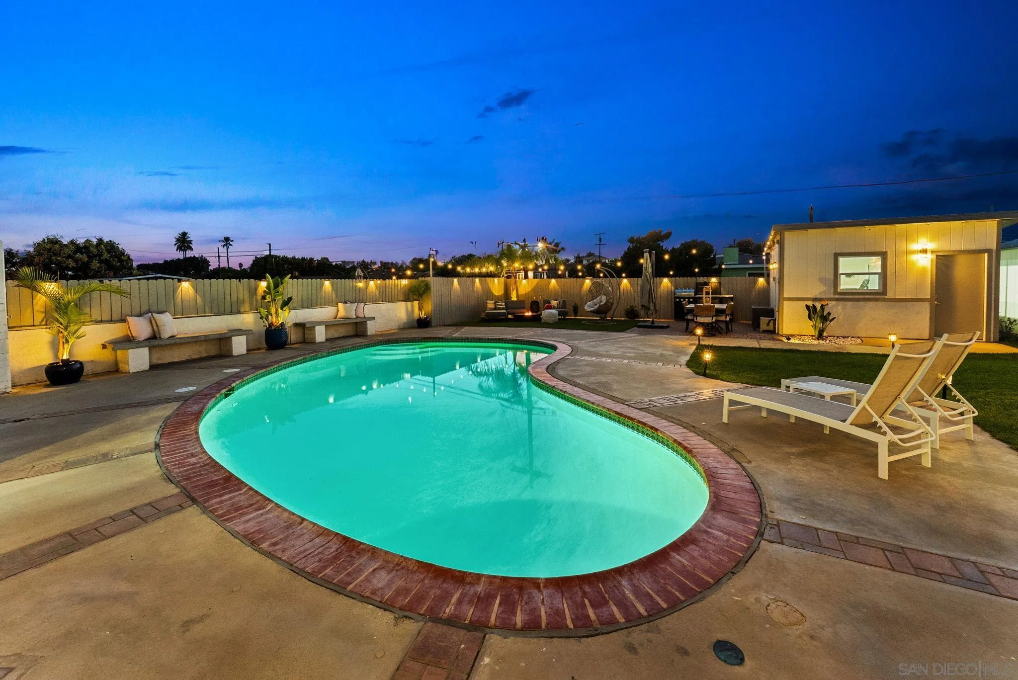 2618 Sheri Lane Lemon Grove, CA 91945 - Photo 34 of 39 a view of a swimming pool with lawn chairs