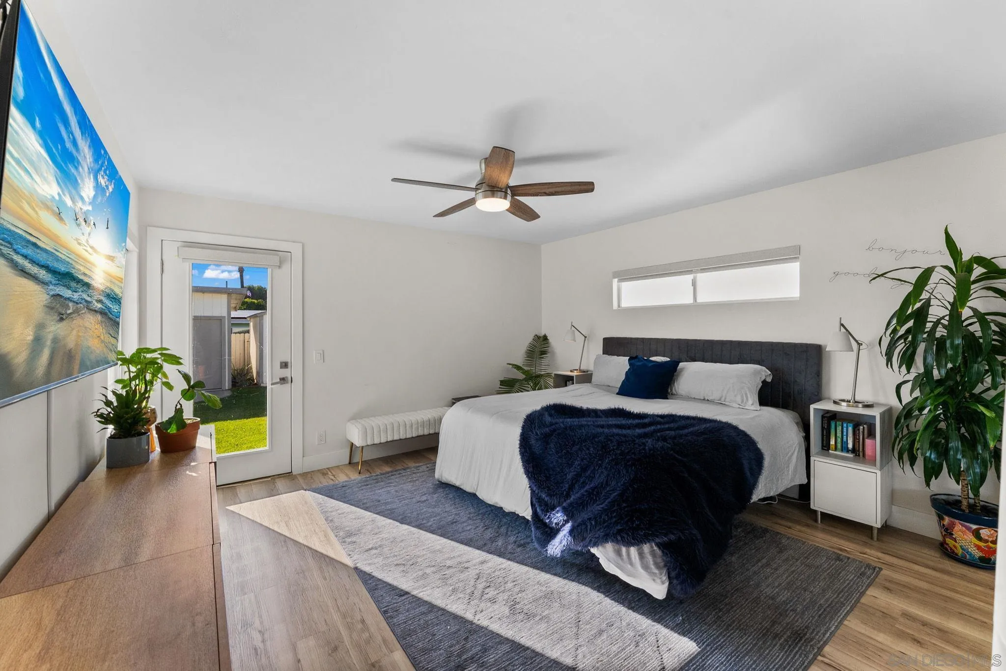 2618 Sheri Lane Lemon Grove, CA 91945 - Photo 10 of 39 a bed room with a bed and a potted plant