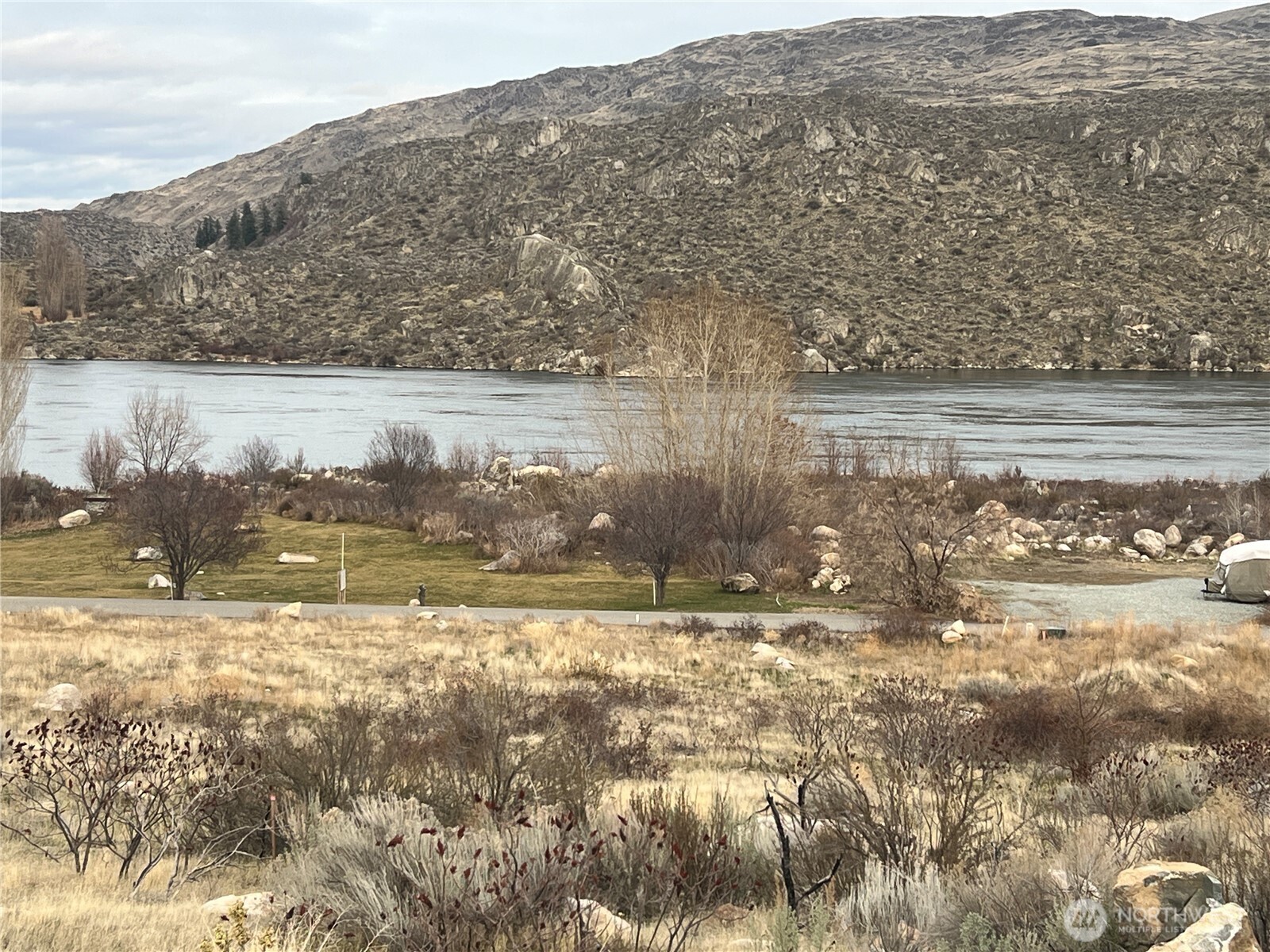 0 Lot 2-boulder Gulch Loop Pateros, WA 98846 - Photo 2 of 6 a view of a lake from a mountain