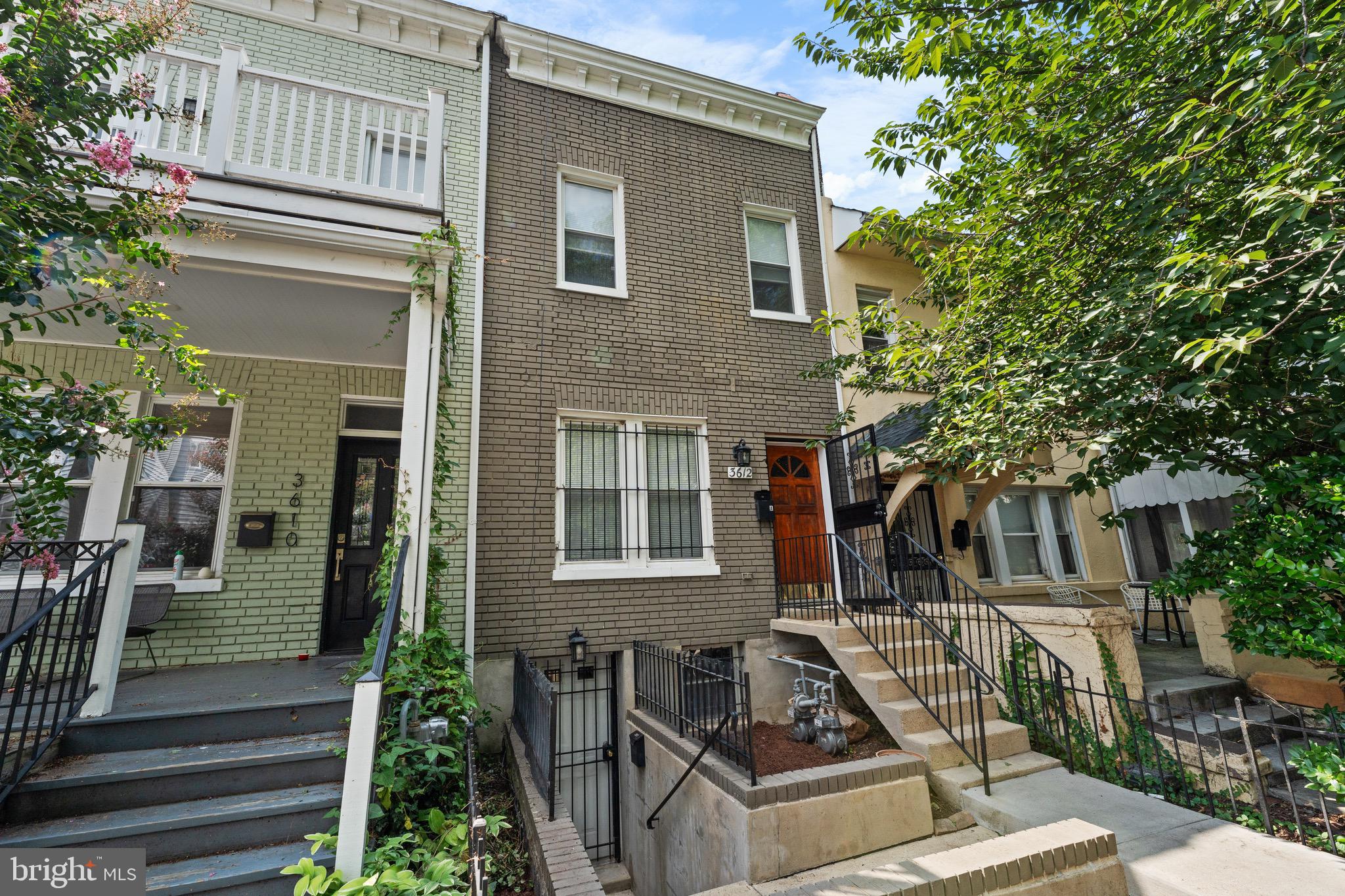 3612 Rock Creek Church Road Northwest, Unit LWR Washington, DC 20010 - Photo 3 of 19 front view of house with a street