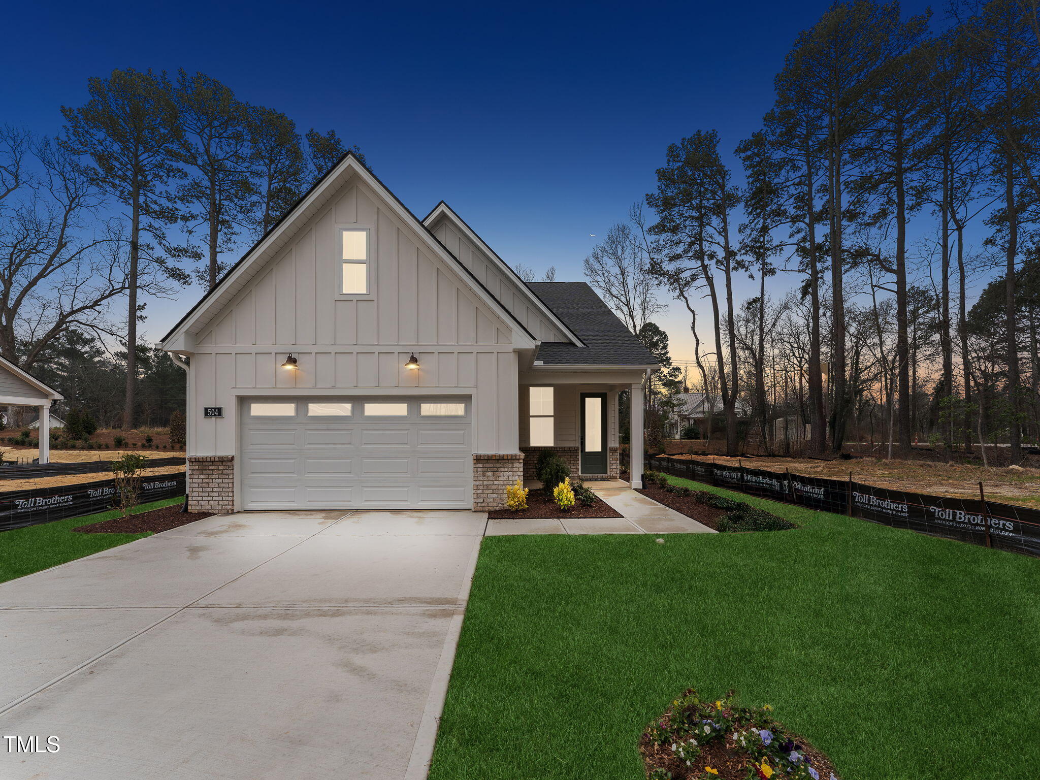 504 Gainer Drive, Unit 2 Raleigh, NC 27610 - Photo 2 of 15 2 Front Exterior dusk
