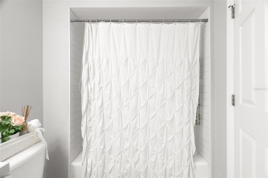 107 South Obrien Street, Unit 217 Tampa, FL 33609 - Photo 12 of 39 a close view of a shower curtain