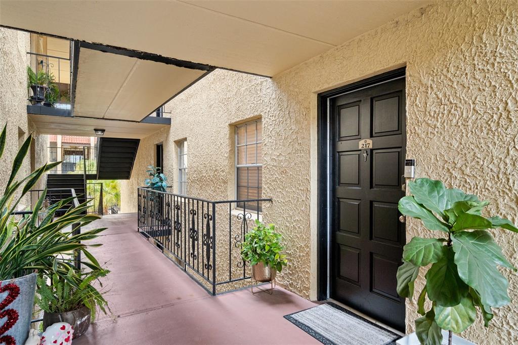 107 South Obrien Street, Unit 217 Tampa, FL 33609 - Photo 2 of 39 a view of a balcony