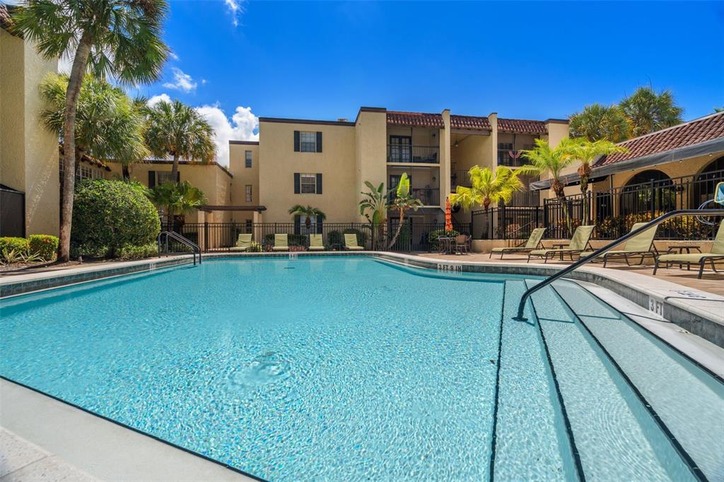 107 South Obrien Street, Unit 217 Tampa, FL 33609 - Photo 26 of 39 a view of a house with backyard porch and sitting area