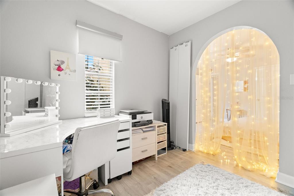 107 South Obrien Street, Unit 217 Tampa, FL 33609 - Photo 8 of 39 a view of a bedroom with a window