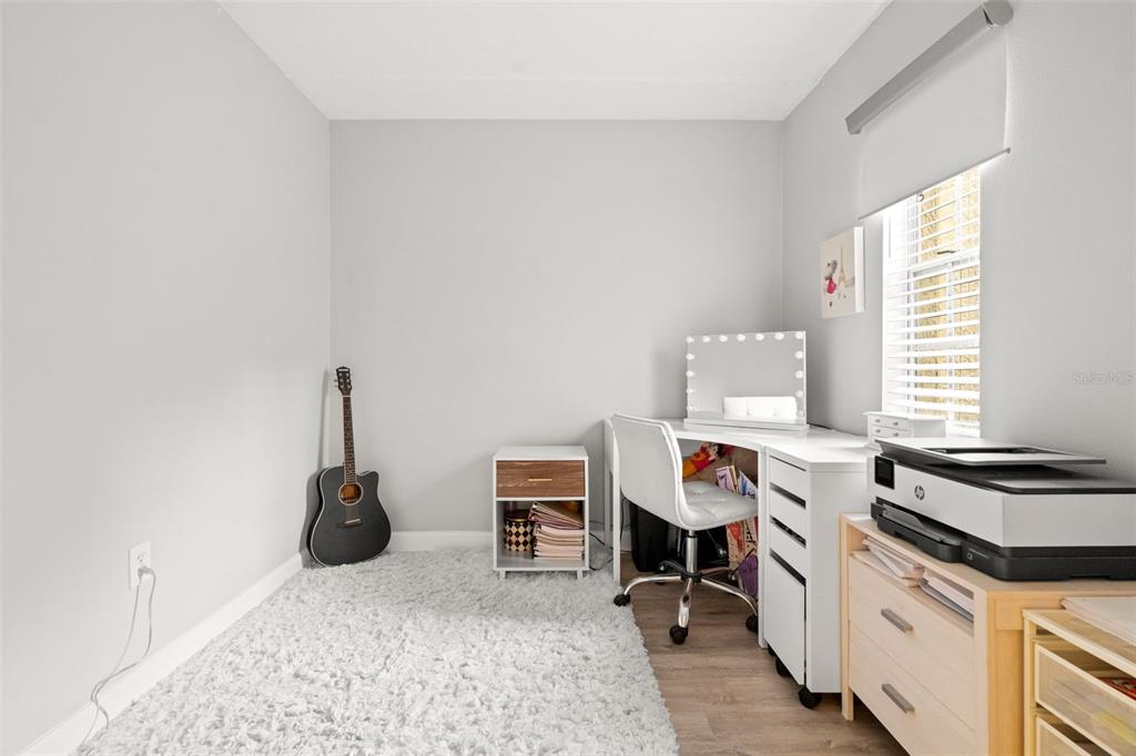 107 South Obrien Street, Unit 217 Tampa, FL 33609 - Photo 9 of 39 a workspace with furniture and window