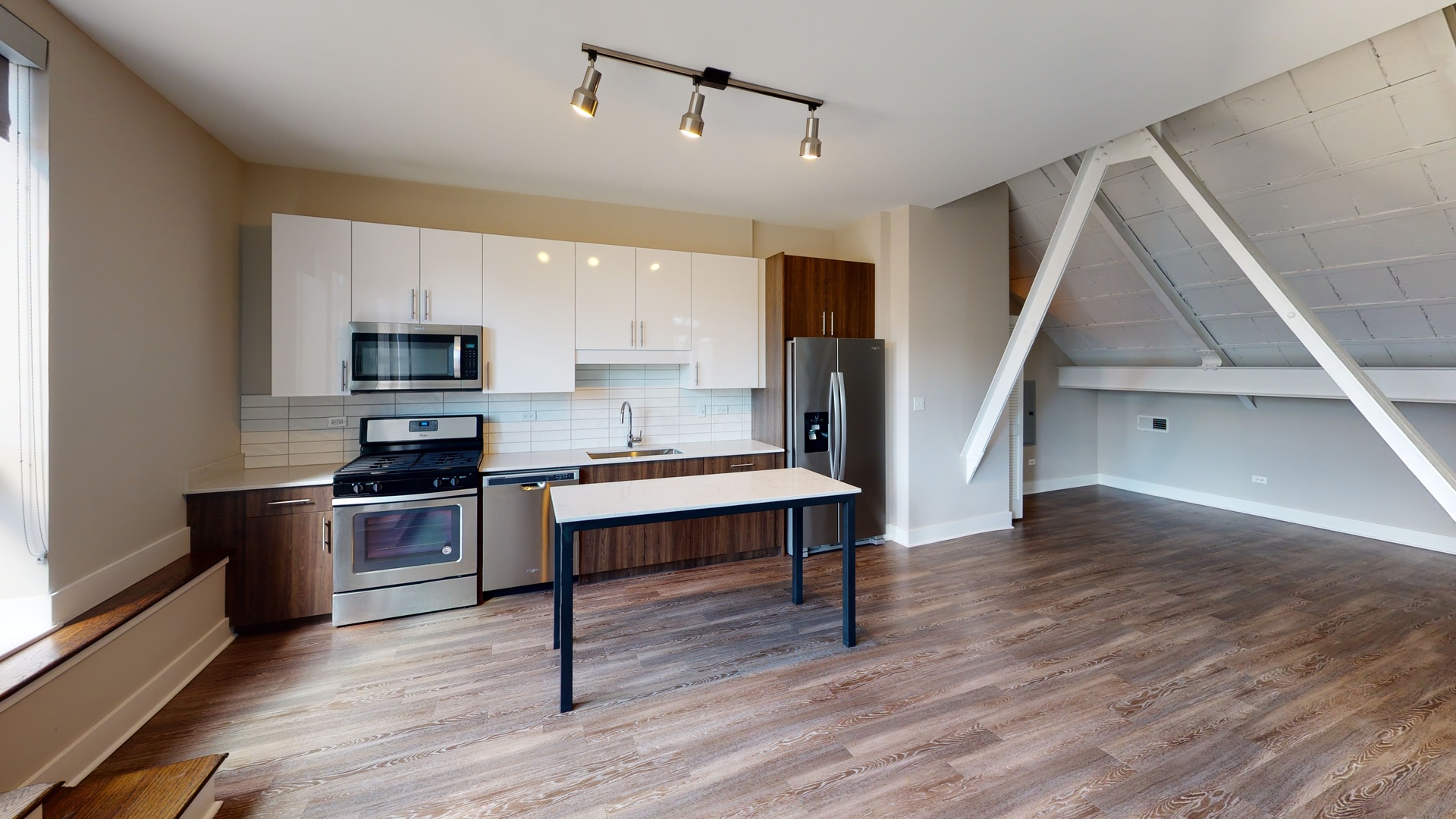 Undisclosed Address Chicago, IL 60640 - Photo 8 of 12 a view of kitchen with sink and wooden floor