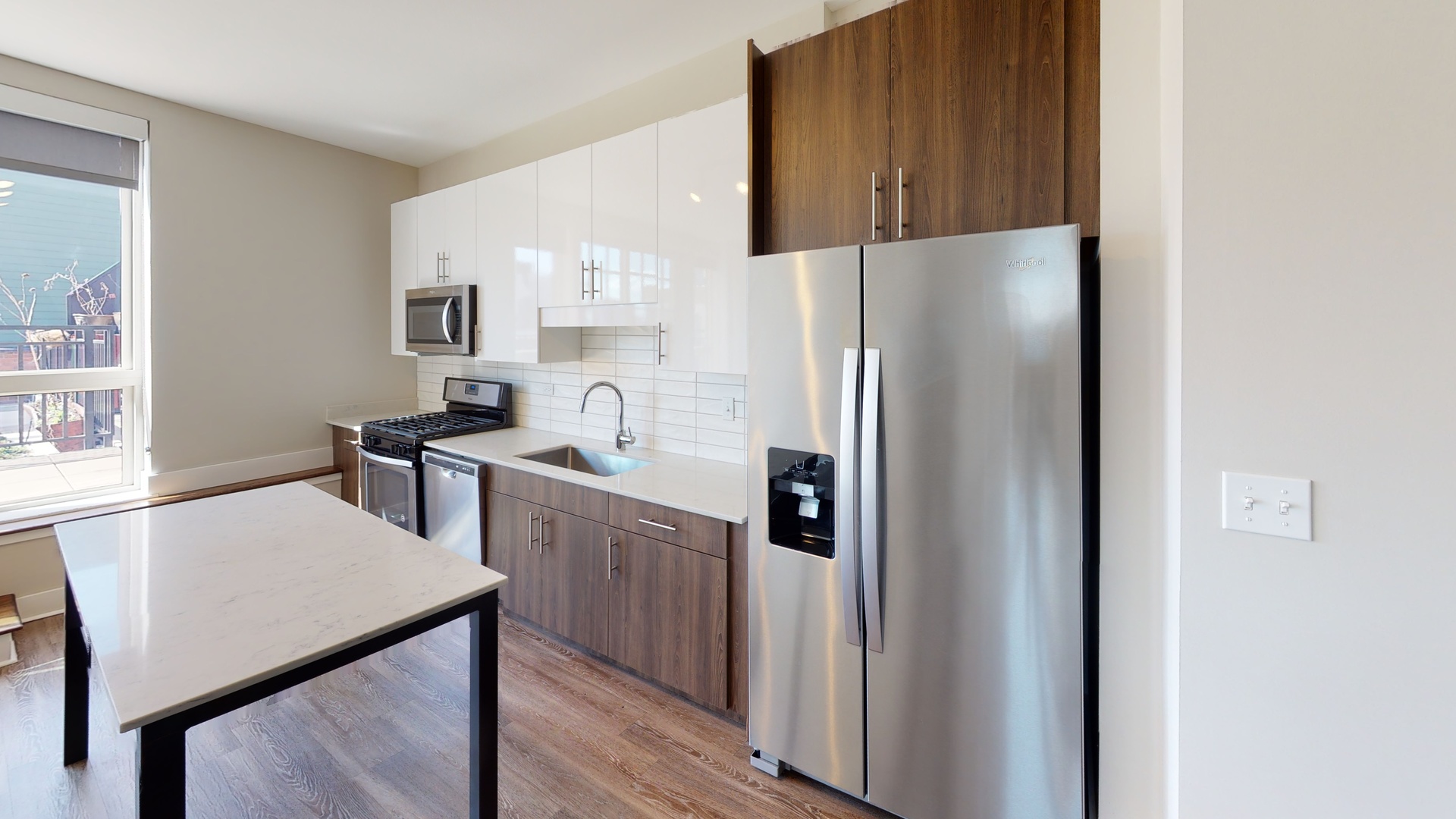 Undisclosed Address Chicago, IL 60640 - Photo 9 of 12 a kitchen with stainless steel appliances a refrigerator and a stove