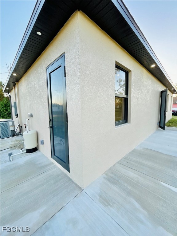 3804 6th Street Southwest Lehigh Acres, FL 33976 - Photo 29 of 45 a view of a livingroom with a patio