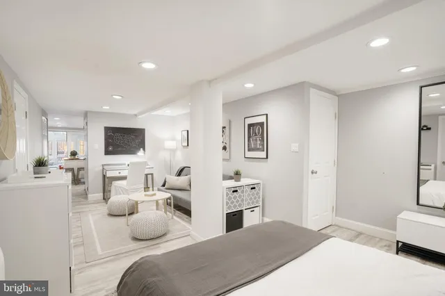 a bedroom with furniture and a bed