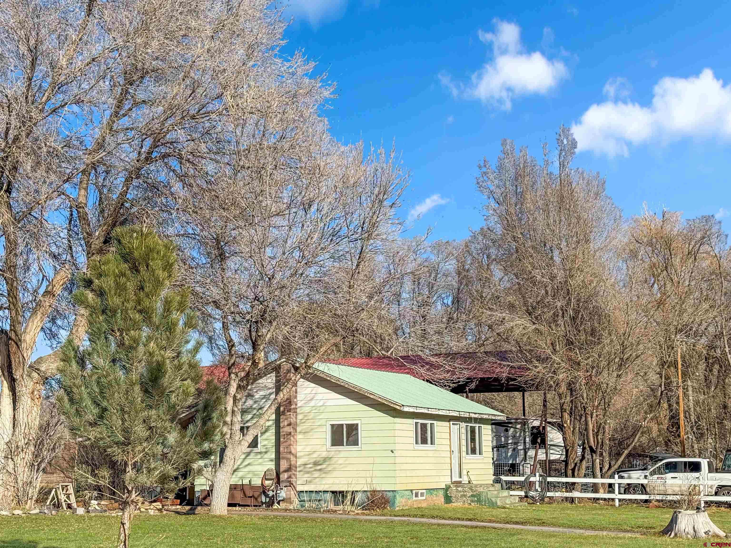 458 Price Road Paonia, CO 81428 - Photo 32 of 44 a front view of a house with a garden