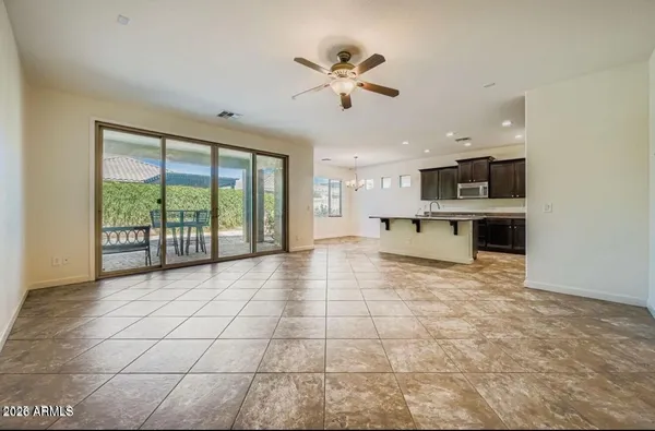 a view of a kitchen with a stove cabinets and a kitchen