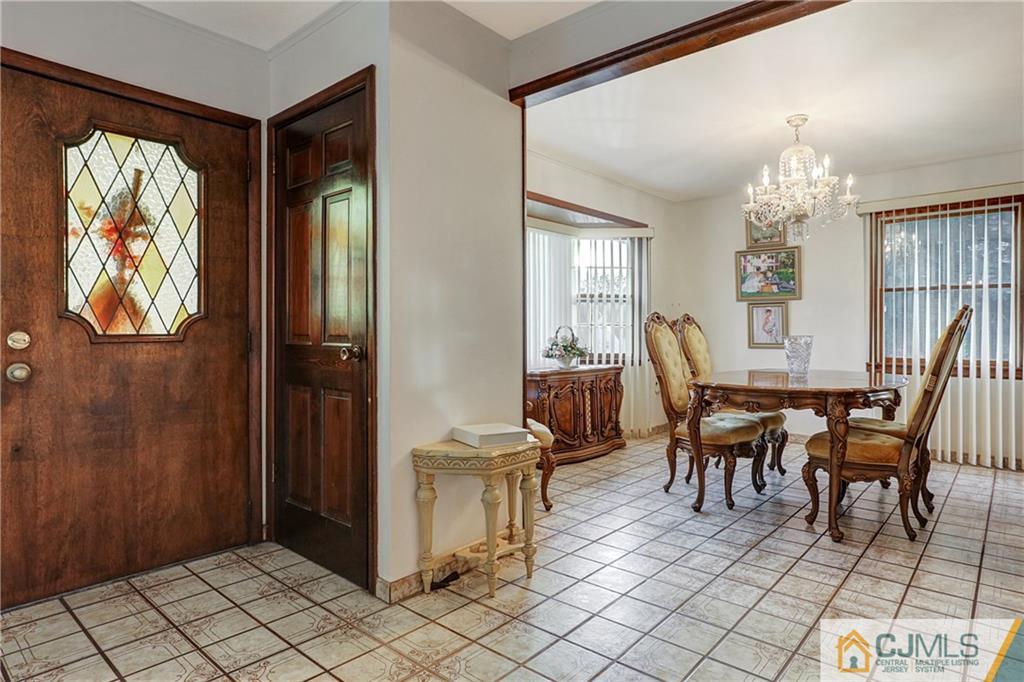 4 Channing Road East Brunswick, NJ 08816 - Photo 3 of 21 a view of a livingroom with furniture and window