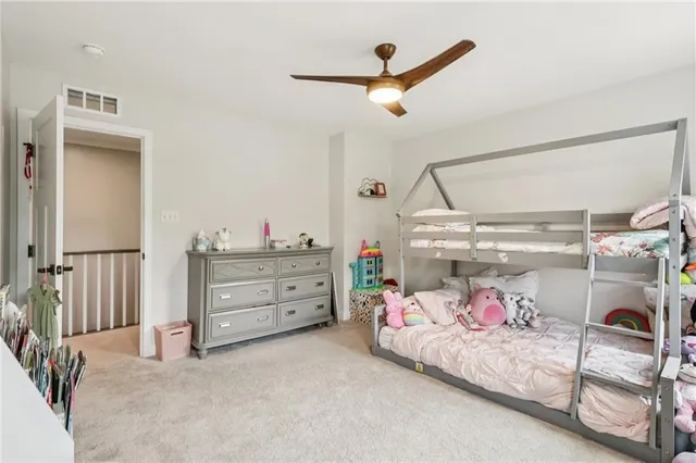 a bedroom with a bed and closet