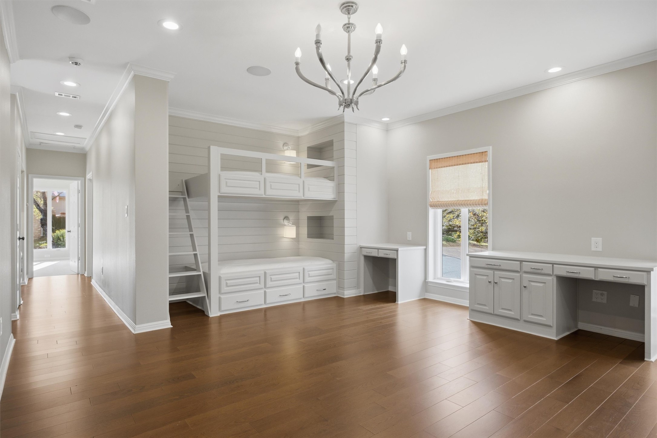 5705 Carry Back Lane Austin, TX 78746 - Photo 26 of 39 a view of an empty room with a window and wooden floor