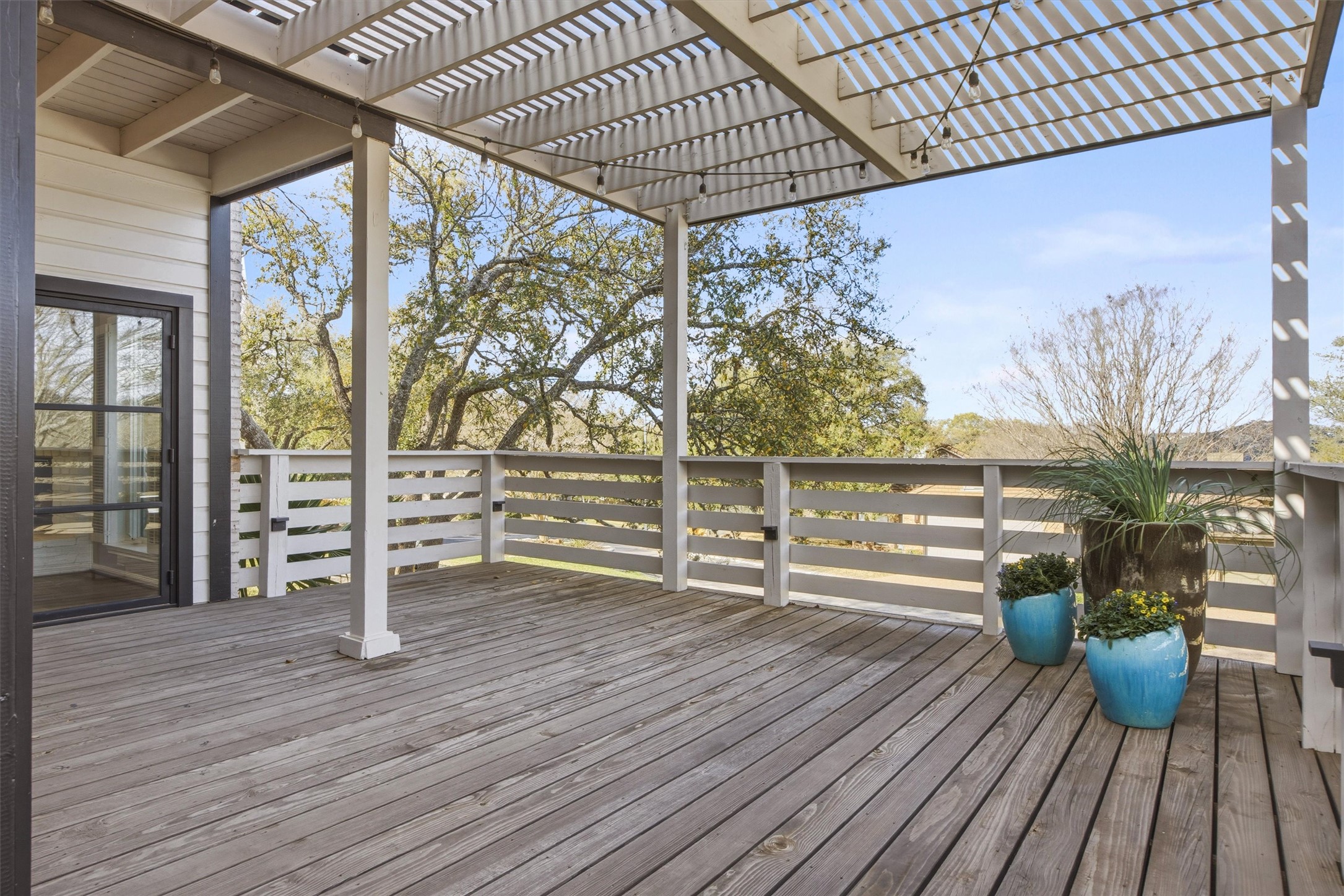 5705 Carry Back Lane Austin, TX 78746 - Photo 34 of 39 a view of outdoor space with wooden floor and outdoor seating