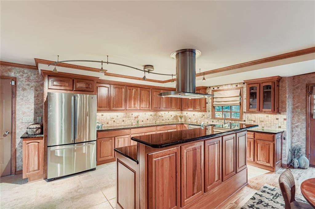 3778 Guilford Court Decatur, GA 30034 - Photo 10 of 29 a kitchen with stainless steel appliances granite countertop a sink and a refrigerator