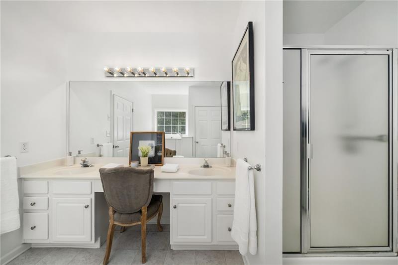 16218 Henderson Road Milton, GA 30004 - Photo 31 of 81 a bathroom with a double vanity sink mirror and