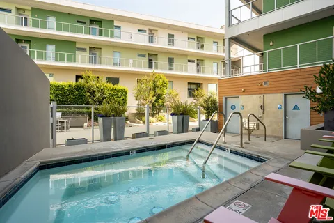 a view of a house with swimming pool