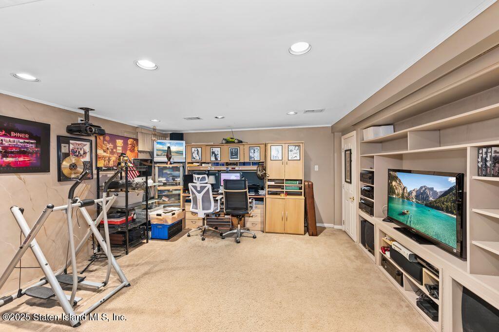 53 Plymouth Road Staten Island, NY 10314 - Photo 18 of 23 a view of a room with gym equipment