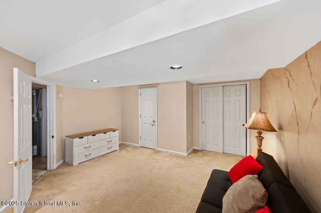 53 Plymouth Road Staten Island, NY 10314 - Photo 19 of 23 a view of livingroom with furniture and closet