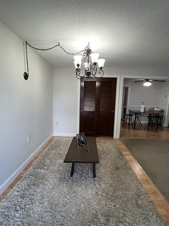 1186 Worcester Road, Unit 611 Framingham, MA 01702 - Photo 4 of 14 a view of a livingroom with furniture