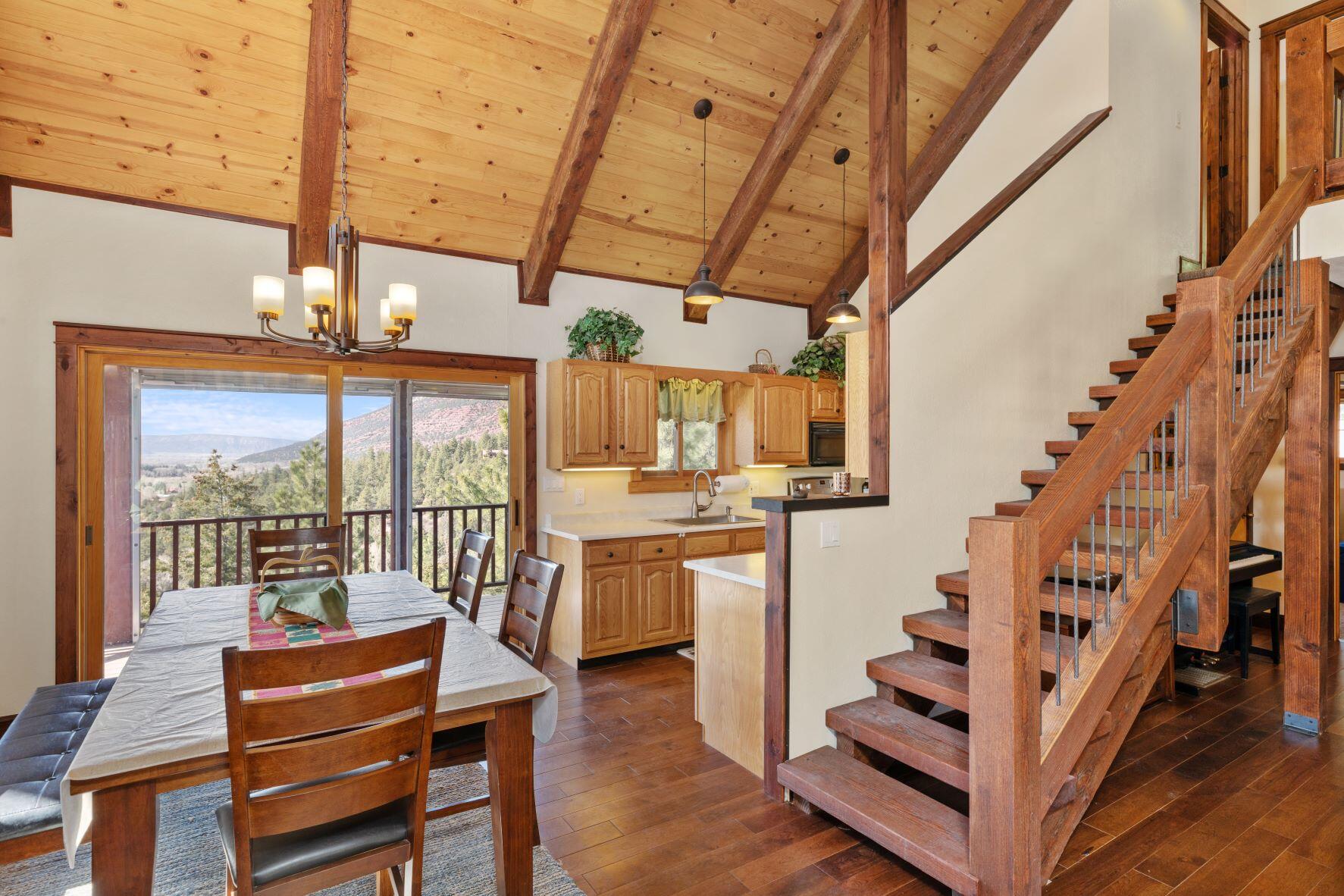 335 Red Stone Road Ridgway, CO 81432 - Photo 9 of 31 dining room kitchen north view 2