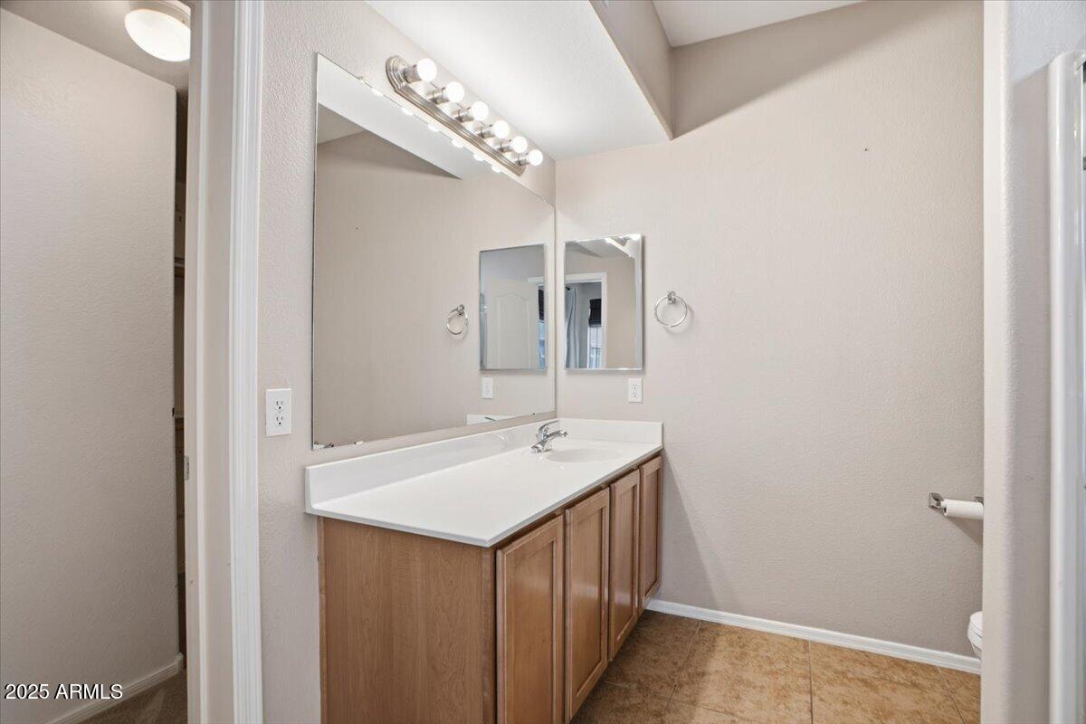 2401 East Rio Salado Parkway, Unit 1045 Tempe, AZ 85288 - Photo 23 of 41 a bathroom with a sink and a mirror