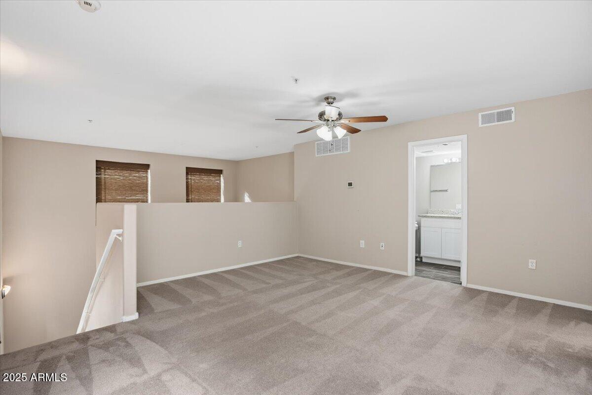 2401 East Rio Salado Parkway, Unit 1045 Tempe, AZ 85288 - Photo 27 of 41 a view of an empty room with a fan
