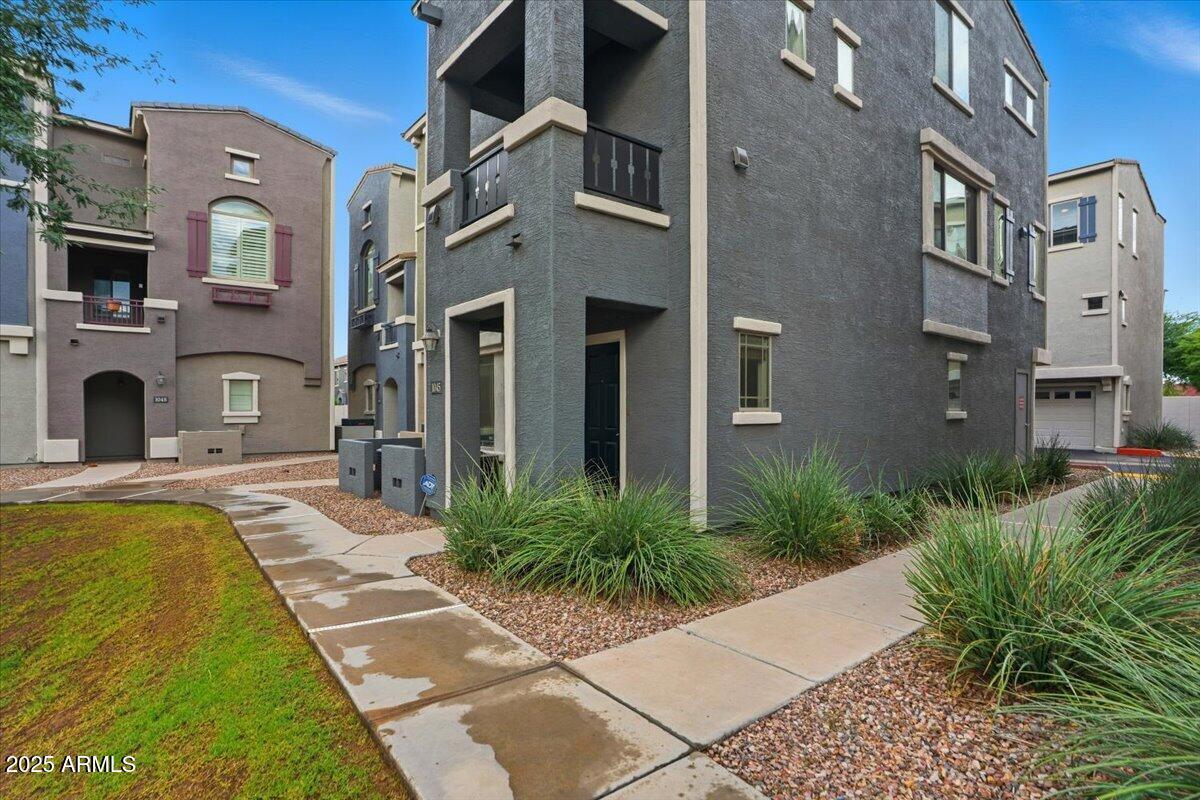 2401 East Rio Salado Parkway, Unit 1045 Tempe, AZ 85288 - Photo 3 of 41 a view of a building with a outdoor space