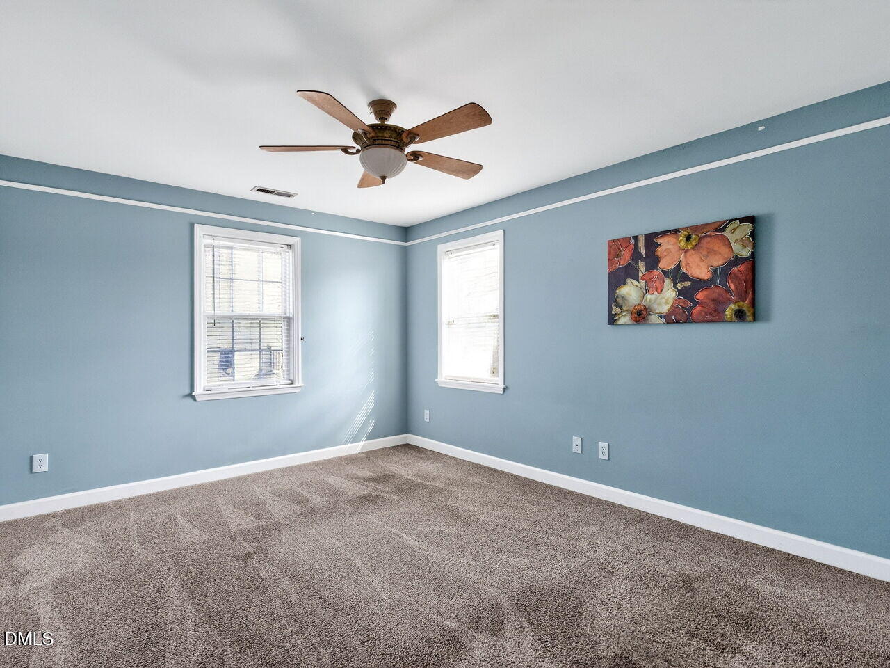 4500 Rivershyre Way Raleigh, NC 27616 - Photo 27 of 42 a view of a livingroom with a ceiling fan and window