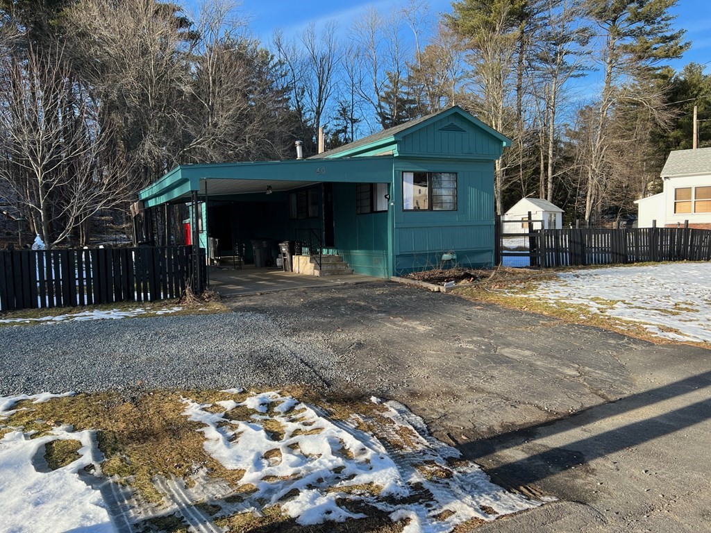 40 Acadia Road Gardner, MA 01440 - Photo 2 of 11 a front view of a house with a yard