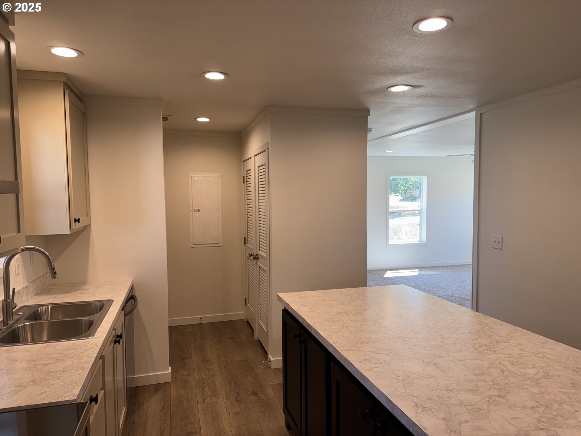 527 West Main Street Goldendale, WA 98620 - Photo 13 of 29 a kitchen with a sink a refrigerator and cabinets