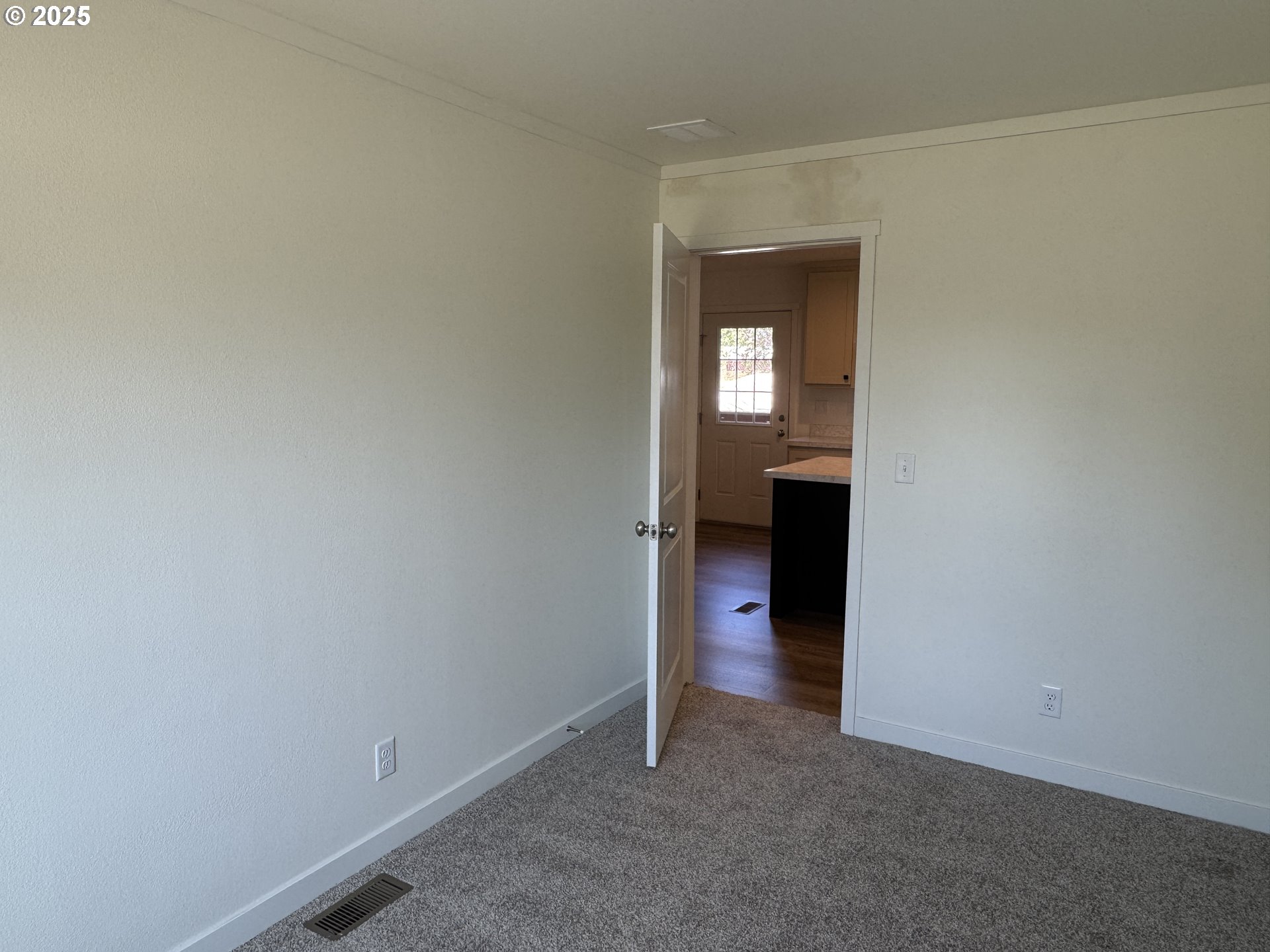 527 West Main Street Goldendale, WA 98620 - Photo 20 of 29 a view of a hallway with wooden shelves