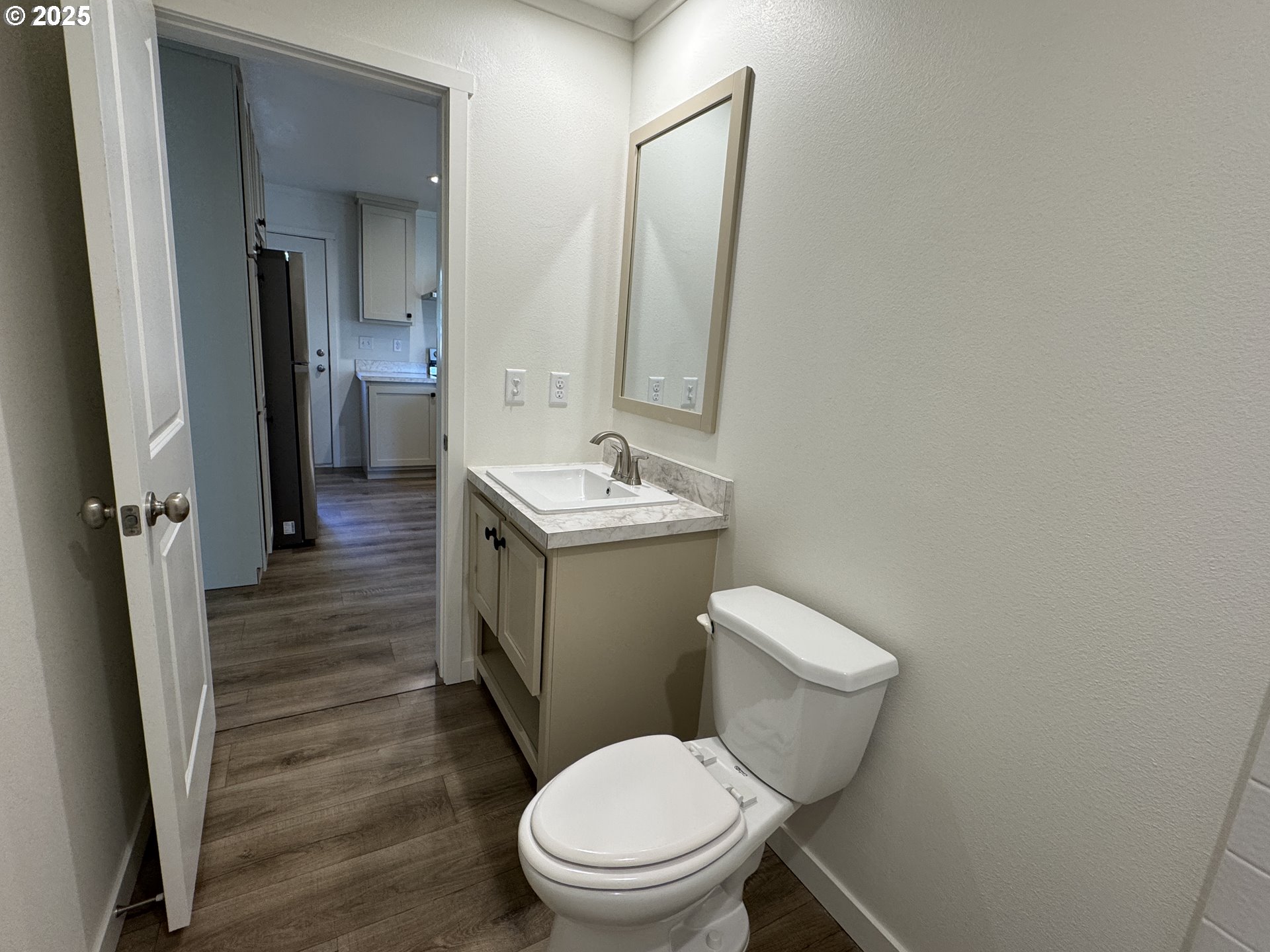 527 West Main Street Goldendale, WA 98620 - Photo 23 of 29 a white toilet sitting next to a bathroom sink