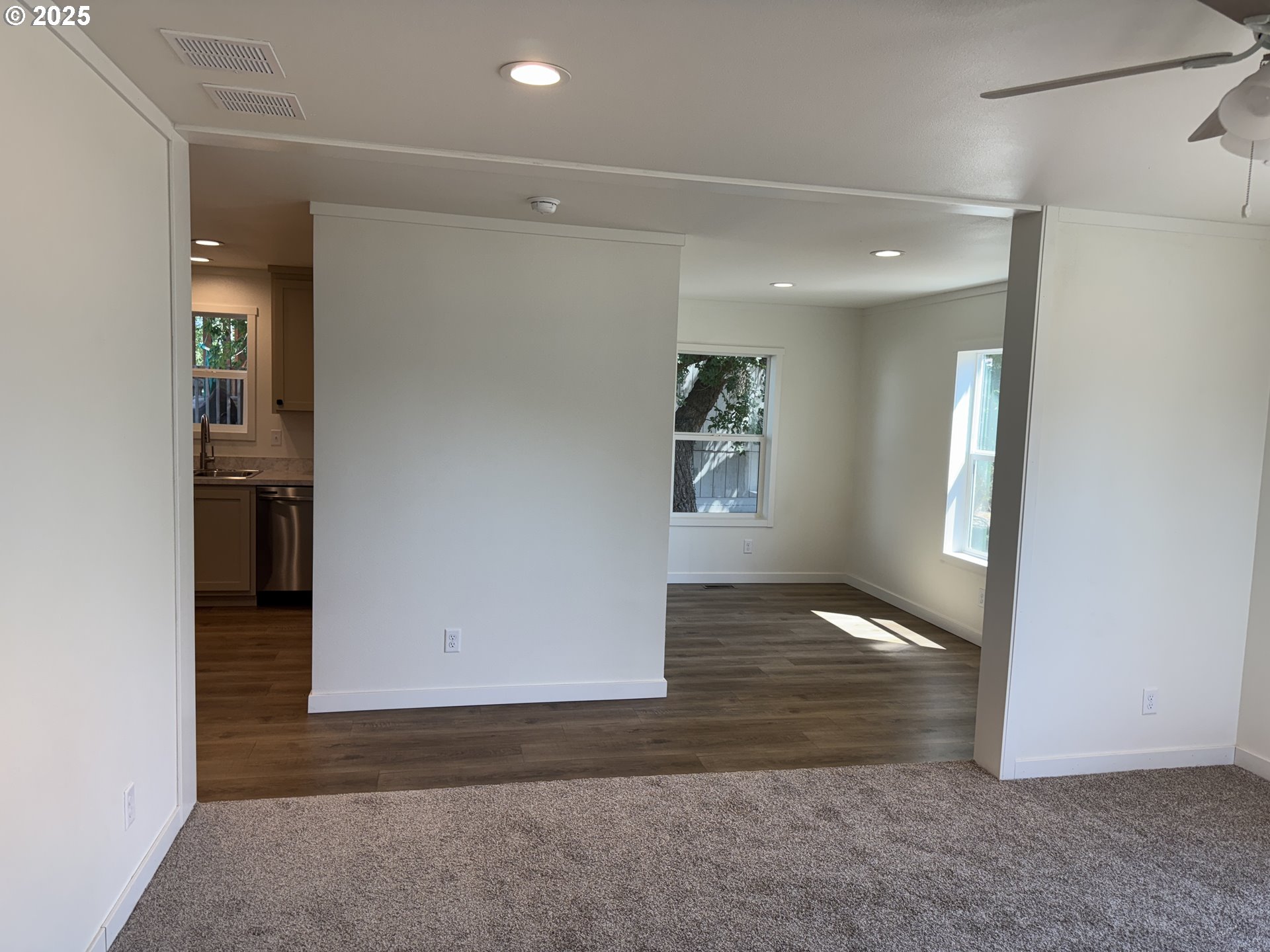 527 West Main Street Goldendale, WA 98620 - Photo 5 of 29 an empty room with windows and entrance