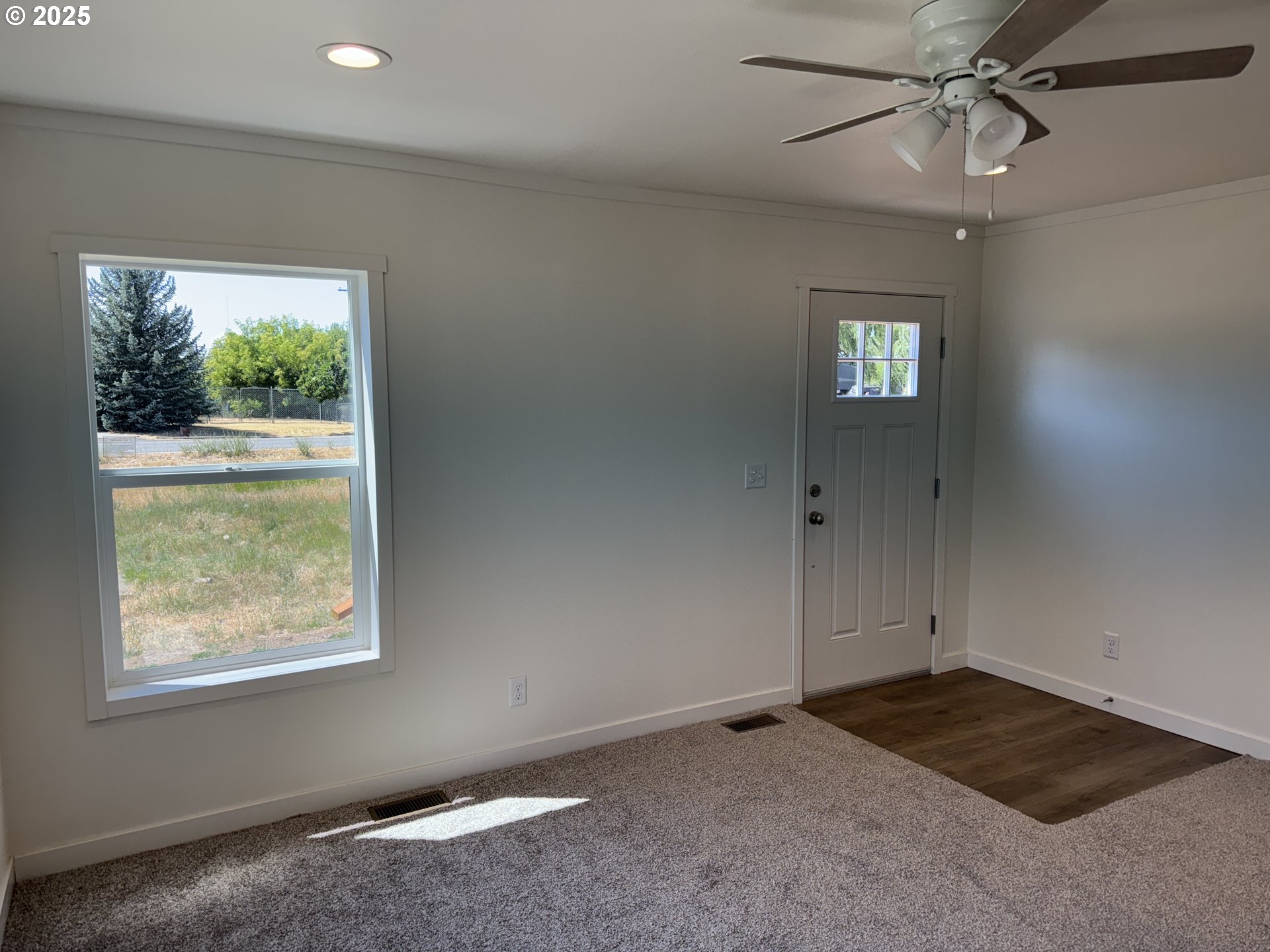 527 West Main Street Goldendale, WA 98620 - Photo 9 of 29 a view of an empty room with a window