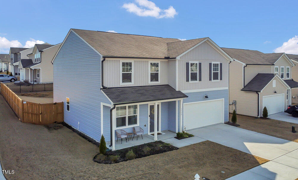 3512 Dragonfly River Raleigh, NC 27604 - Photo 2 of 37 a front view of a house with a yard