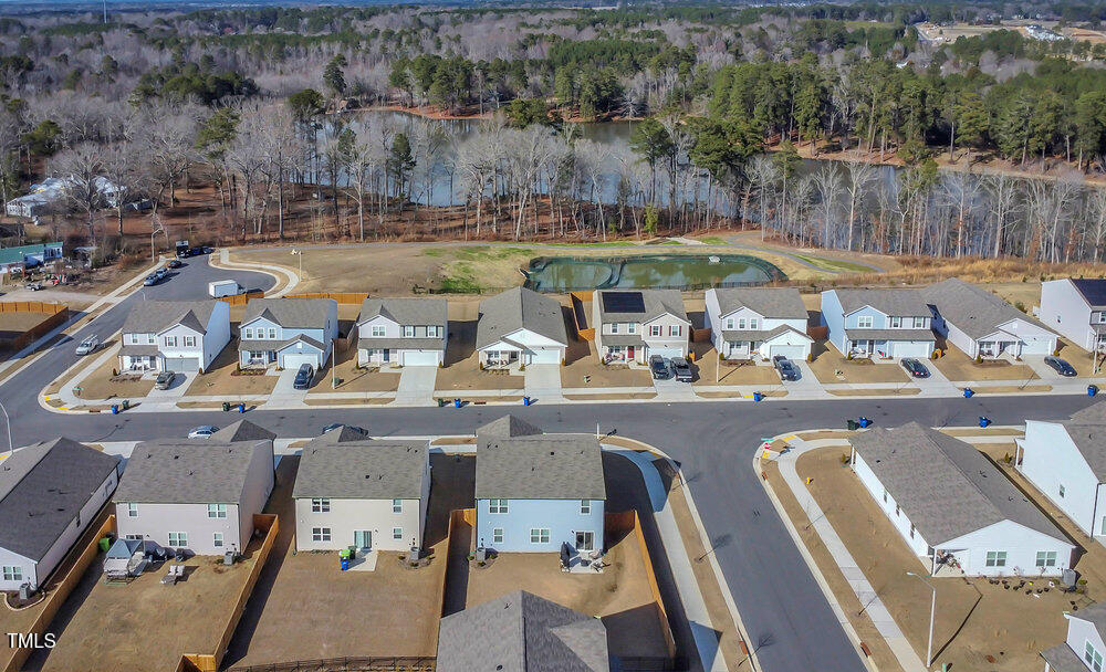 3512 Dragonfly River Raleigh, NC 27604 - Photo 32 of 37 an aerial view of a swimming pool with outdoor seating